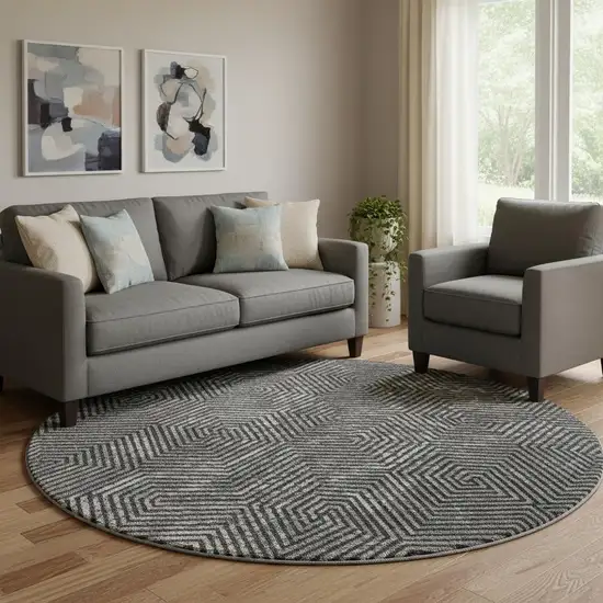 8' Black And Ivory Geometric Washable Round Rug With UV Protection Photo 1