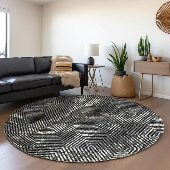8' Black And Ivory Geometric Washable Round Rug With UV Protection Photo 5