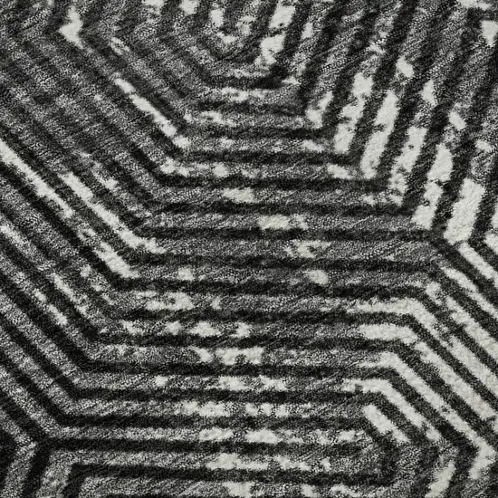 8' Black And Ivory Geometric Washable Round Rug With UV Protection Photo 9