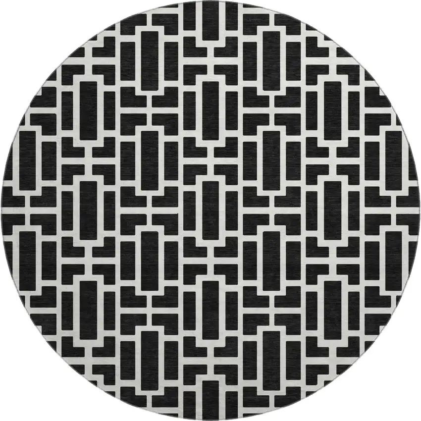 8' Black And Ivory Geometric Washable Round Rug With UV Protection Photo 1