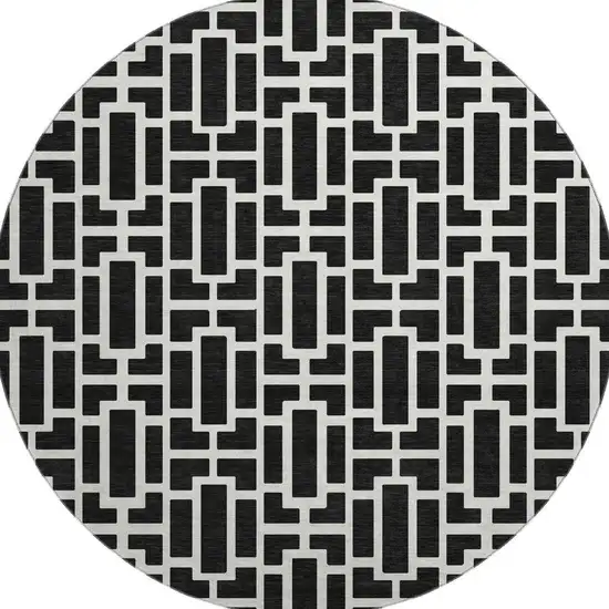 8' Black And Ivory Geometric Washable Round Rug With UV Protection Photo 4