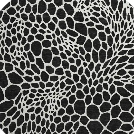 8' Black And Ivory Geometric Washable Round Rug With UV Protection Photo 3