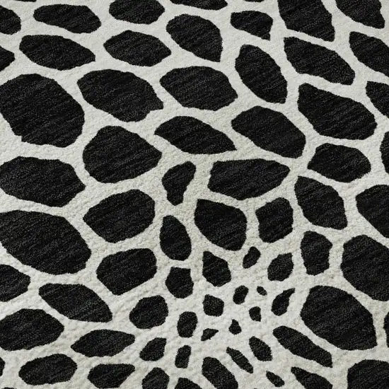 8' Black And Ivory Geometric Washable Round Rug With UV Protection Photo 9