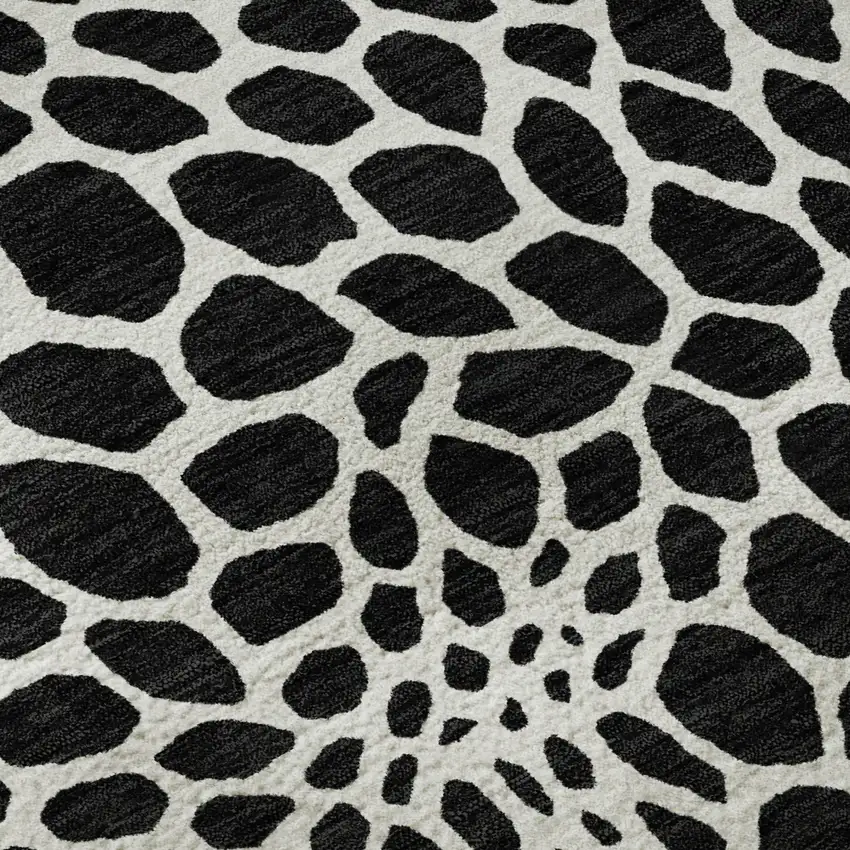 8' Black And Ivory Geometric Washable Round Rug With UV Protection Photo 9