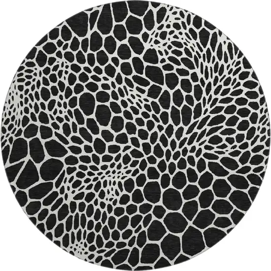 8' Black And Ivory Geometric Washable Round Rug With UV Protection Photo 1