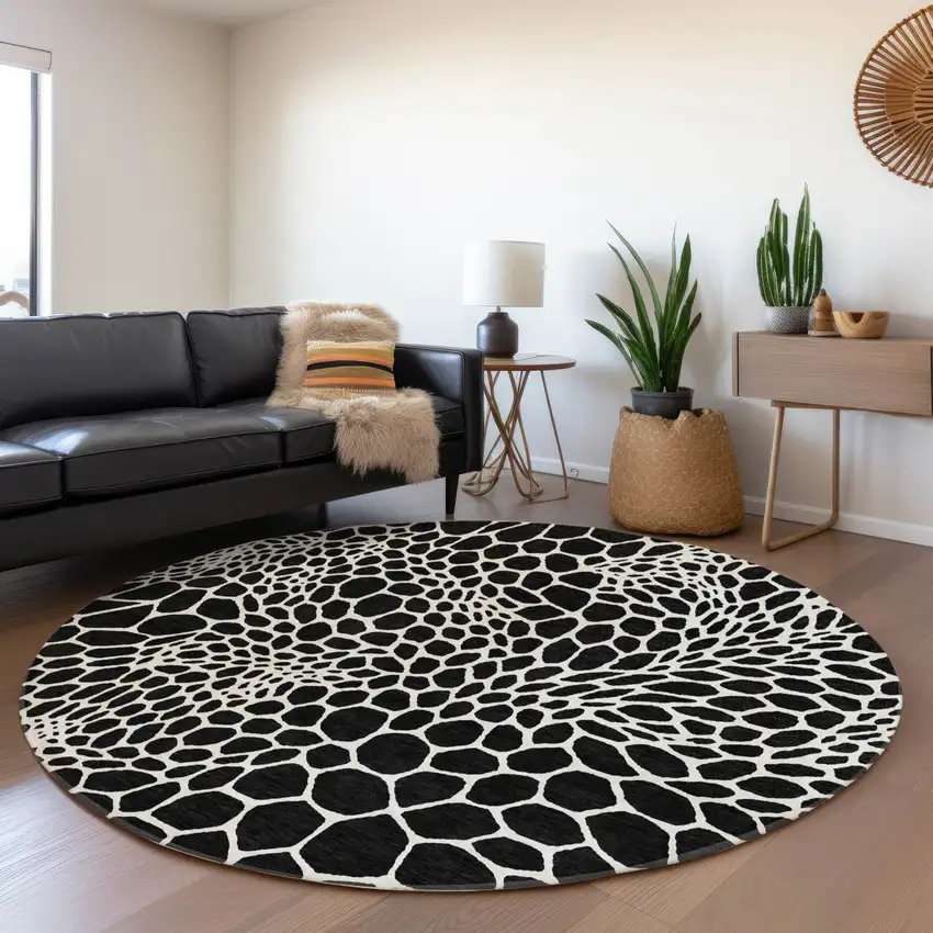8' Black And Ivory Geometric Washable Round Rug With UV Protection Photo 5