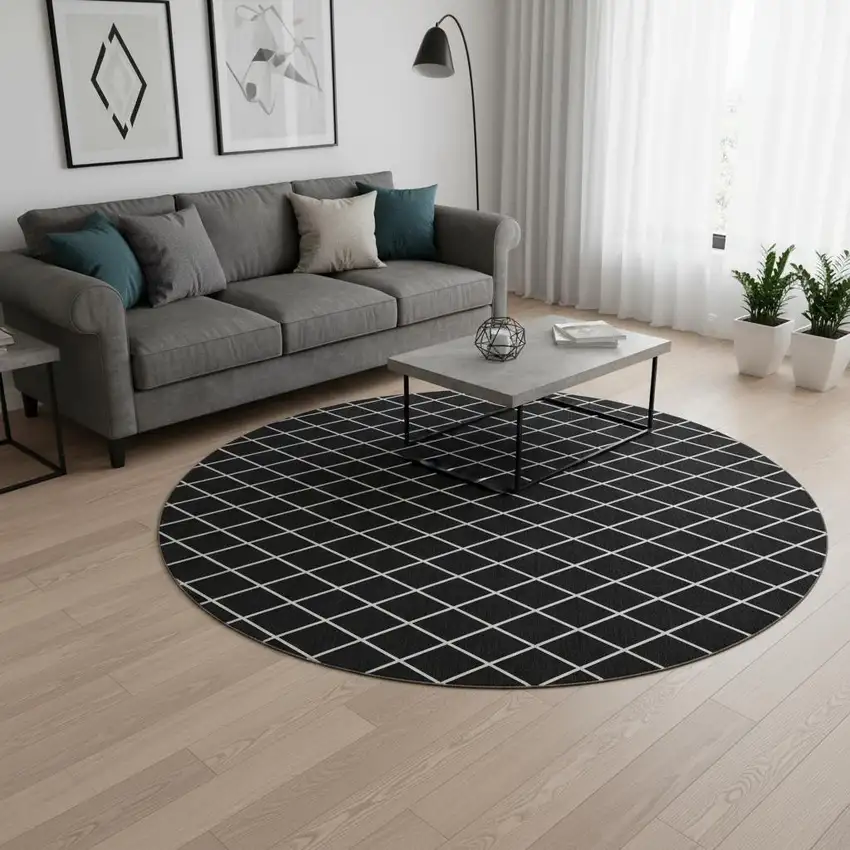 8' Black And Ivory Geometric Washable Round Rug With UV Protection Photo 2