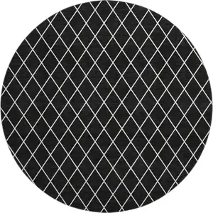 Photo of 8' Black And Ivory Geometric Washable Round Rug With UV Protection
