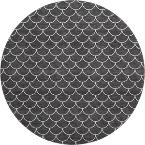 Photo of 8' Black And Ivory Geometric Washable Round Rug With UV Protection