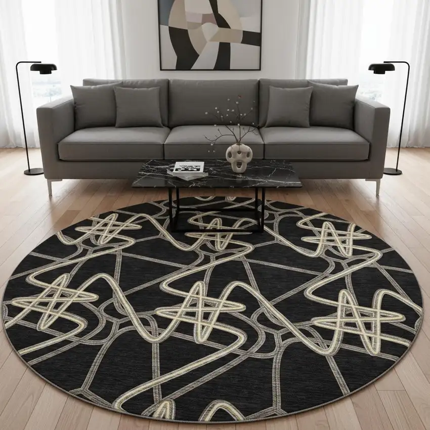 8' Black And Ivory Geometric Washable Round Rug With UV Protection Photo 2