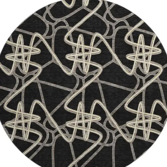 8' Black And Ivory Geometric Washable Round Rug With UV Protection Photo 3