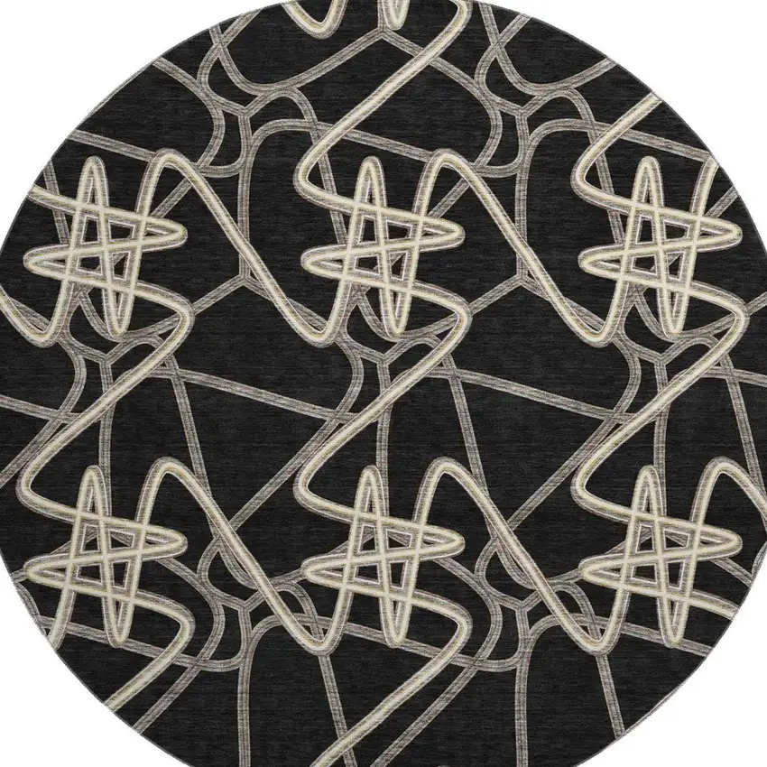 8' Black And Ivory Geometric Washable Round Rug With UV Protection Photo 3