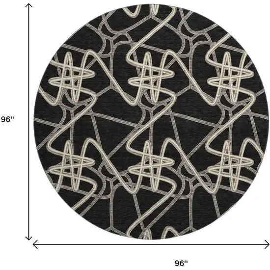 8' Black And Ivory Geometric Washable Round Rug With UV Protection Photo 9