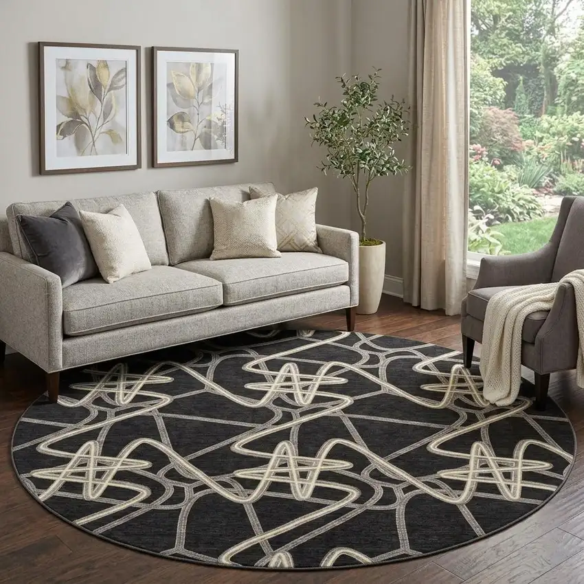 8' Black And Ivory Geometric Washable Round Rug With UV Protection Photo 1