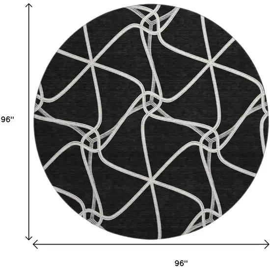 8' Black And Ivory Geometric Washable Round Rug With UV Protection Photo 9