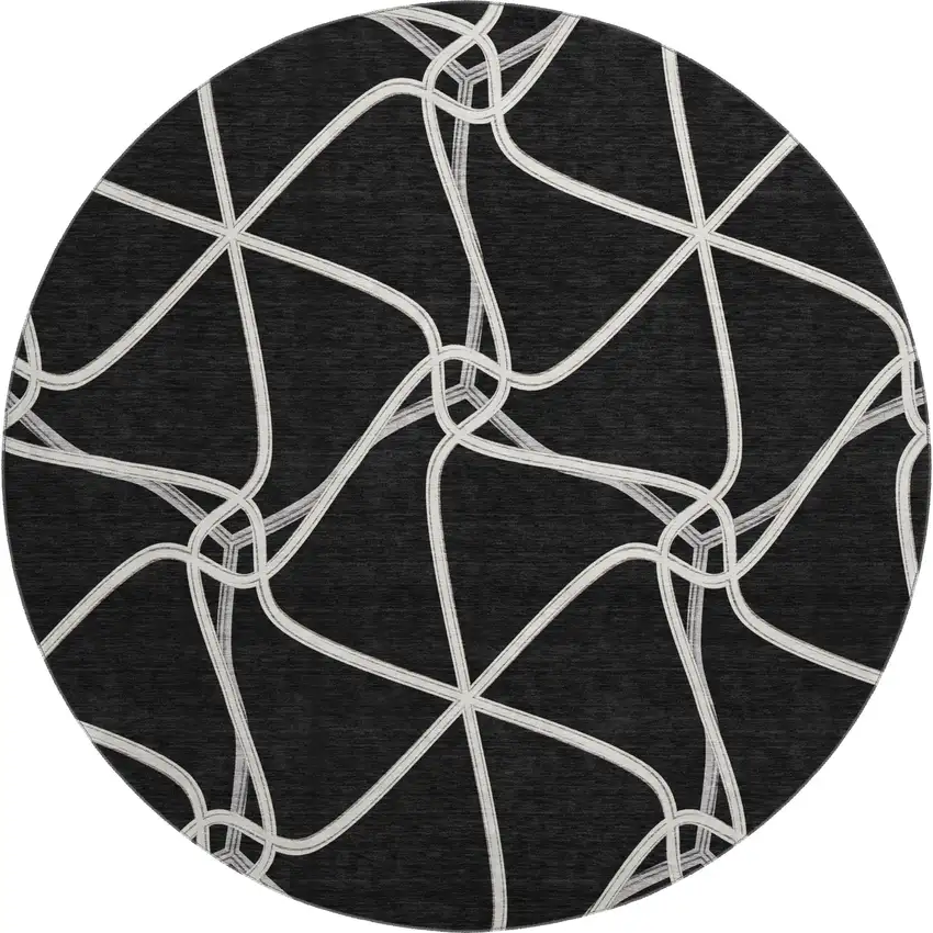 8' Black And Ivory Geometric Washable Round Rug With UV Protection Photo 1