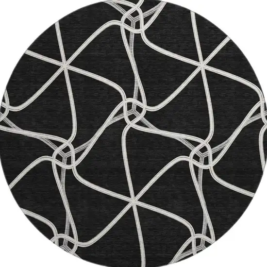 8' Black And Ivory Geometric Washable Round Rug With UV Protection Photo 3