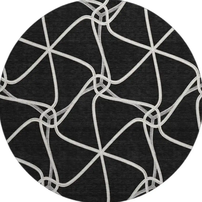 8' Black And Ivory Geometric Washable Round Rug With UV Protection Photo 3