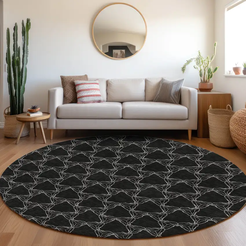 8' Black And Ivory Geometric Washable Round Rug With UV Protection Photo 4