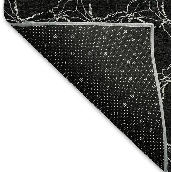 8' Black And Ivory Geometric Washable Round Rug With UV Protection Photo 5