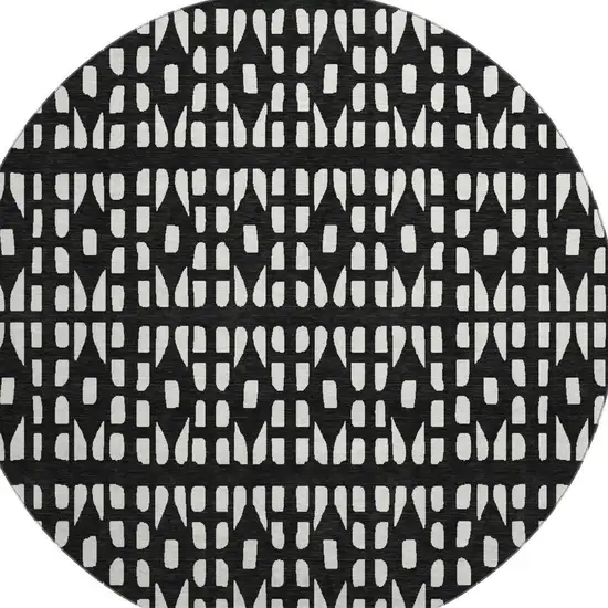 8' Black And Ivory Geometric Washable Round Rug With UV Protection Photo 2