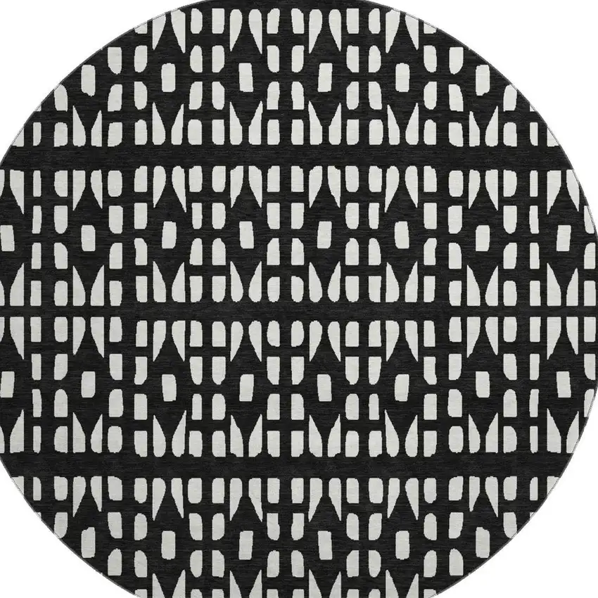 8' Black And Ivory Geometric Washable Round Rug With UV Protection Photo 2