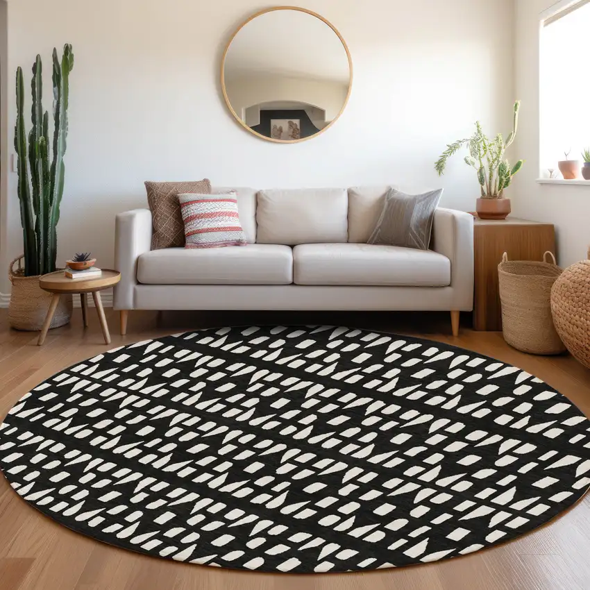 8' Black And Ivory Geometric Washable Round Rug With UV Protection Photo 4