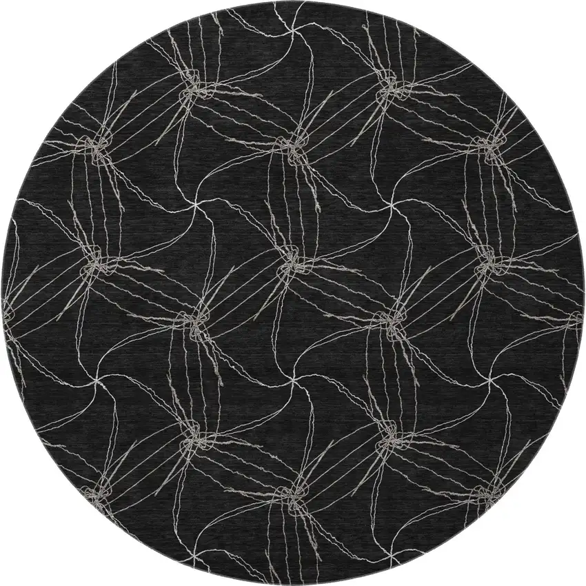 8' Black And Ivory Geometric Washable Round Rug With UV Protection Photo 3