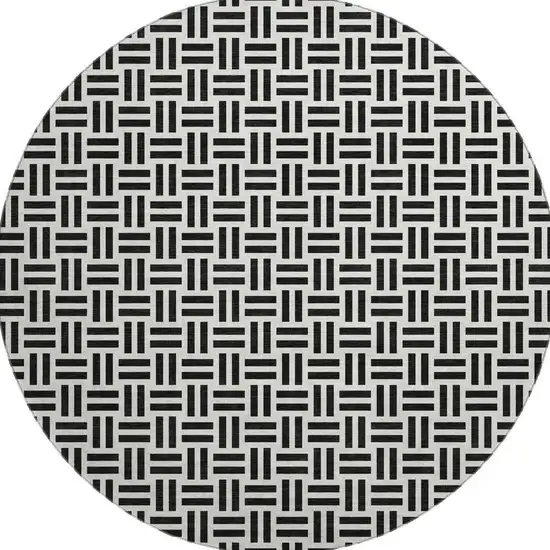8' Black And Ivory Geometric Washable Round Rug With UV Protection Photo 3