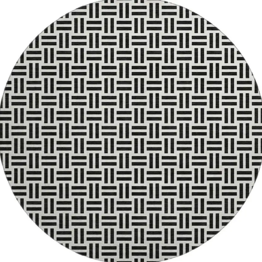 8' Black And Ivory Geometric Washable Round Rug With UV Protection Photo 3
