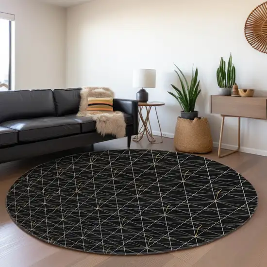 8' Black And Ivory Geometric Washable Round Rug With UV Protection Photo 4