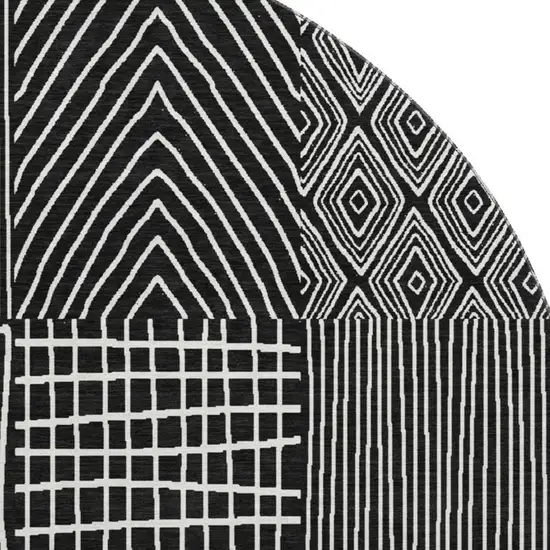 8' Black And Ivory Geometric Washable Round Rug With UV Protection Photo 3