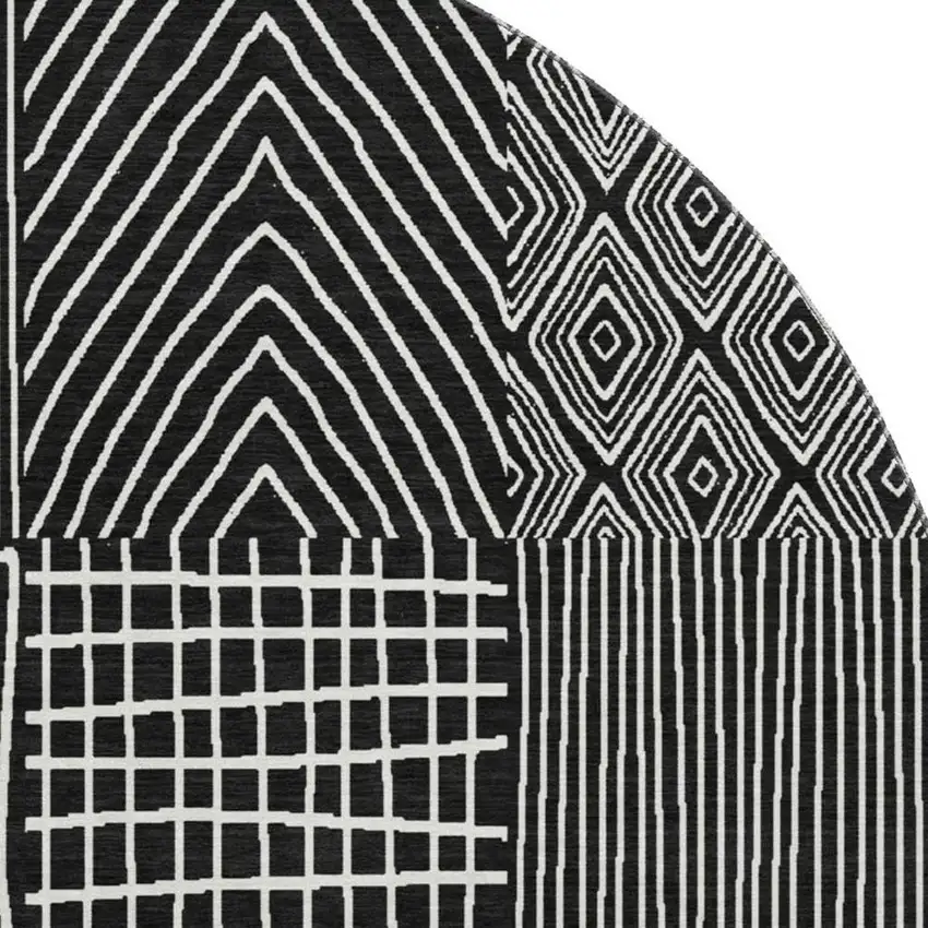 8' Black And Ivory Geometric Washable Round Rug With UV Protection Photo 3