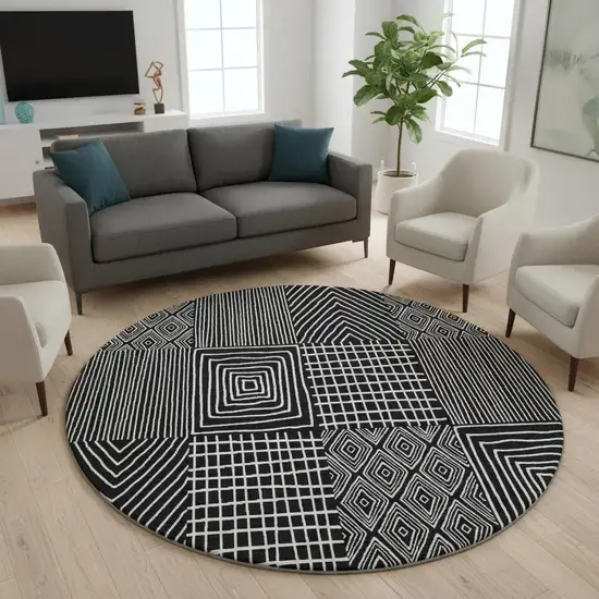 8' Black And Ivory Geometric Washable Round Rug With UV Protection Photo 2