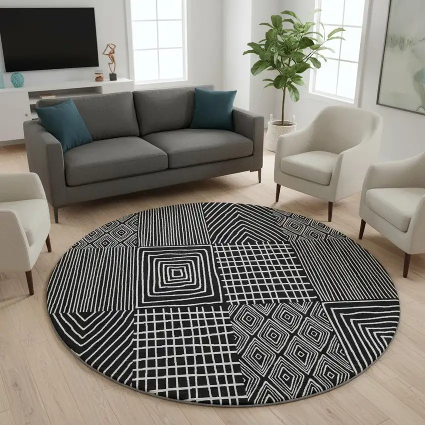 8' Black And Ivory Geometric Washable Round Rug With UV Protection Photo 2