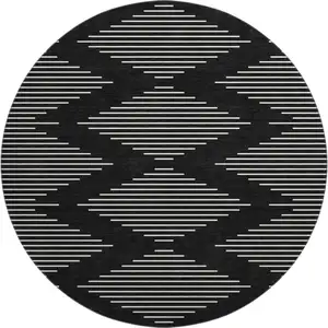 Photo of 8' Black And Ivory Geometric Washable Round Rug With UV Protection
