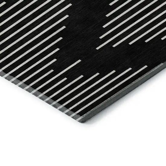 8' Black And Ivory Geometric Washable Round Rug With UV Protection Photo 5