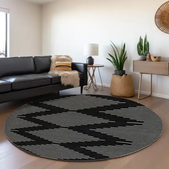 8' Black And Ivory Geometric Washable Round Rug With UV Protection Photo 3