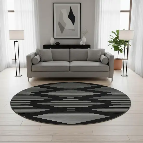 8' Black And Ivory Geometric Washable Round Rug With UV Protection Photo 2