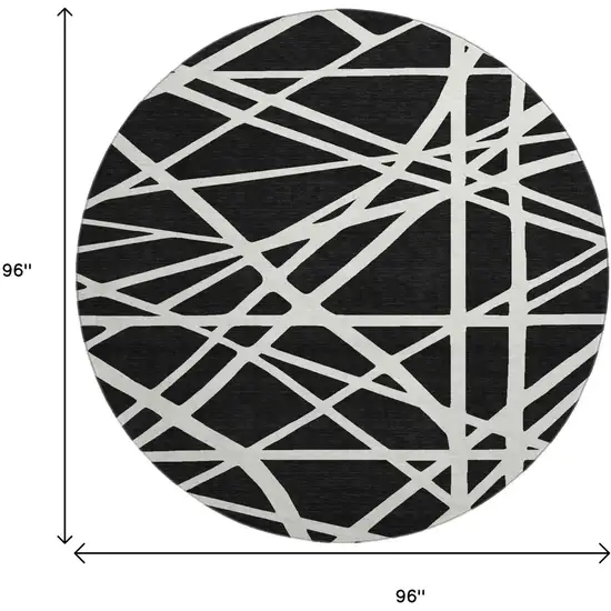 8' Black And Ivory Geometric Washable Round Rug With UV Protection Photo 9