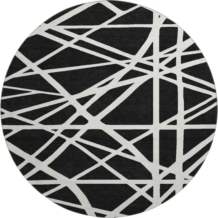 8' Black And Ivory Geometric Washable Round Rug With UV Protection Photo 1