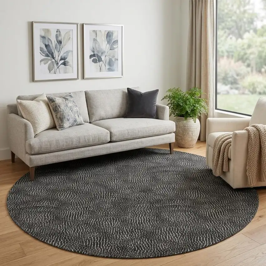 8' Black And Ivory Geometric Washable Round Rug With UV Protection Photo 1
