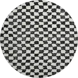 Photo of 8' Black And Ivory Geometric Washable Round Rug With UV Protection