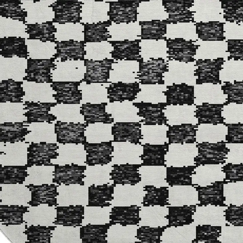 8' Black And Ivory Geometric Washable Round Rug With UV Protection Photo 3