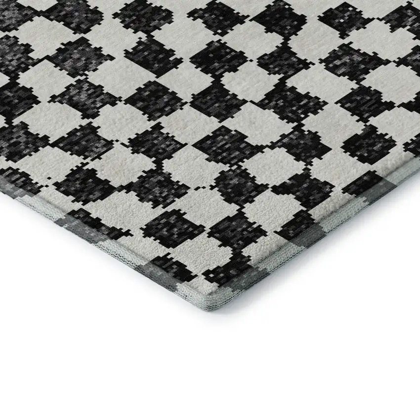 8' Black And Ivory Geometric Washable Round Rug With UV Protection Photo 7