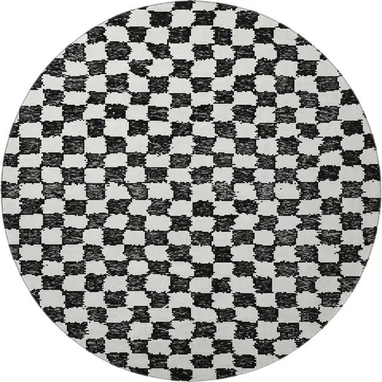 8' Black And Ivory Geometric Washable Round Rug With UV Protection Photo 4