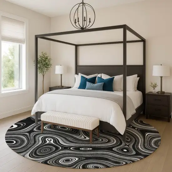 8' Black And Ivory Geometric Washable Round Rug With UV Protection Photo 5