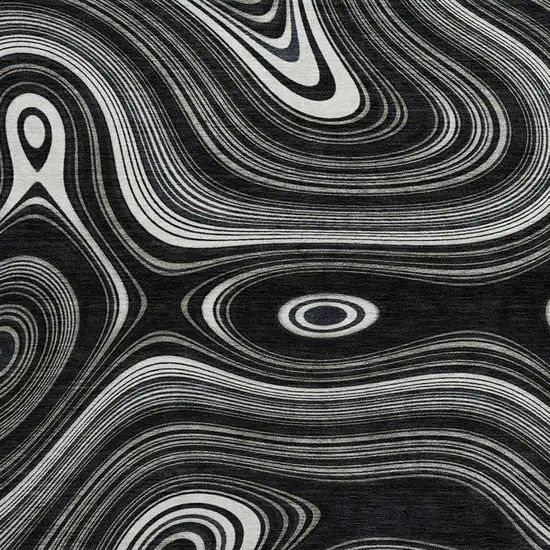 8' Black And Ivory Geometric Washable Round Rug With UV Protection Photo 3