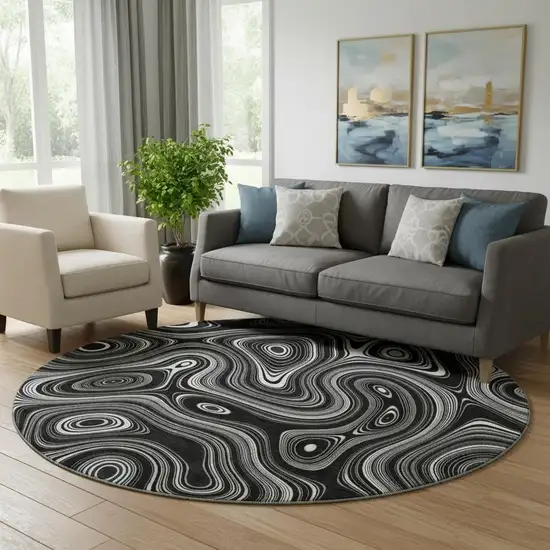 8' Black And Ivory Geometric Washable Round Rug With UV Protection Photo 2