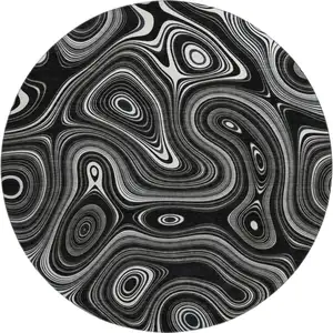 Photo of 8' Black And Ivory Geometric Washable Round Rug With UV Protection